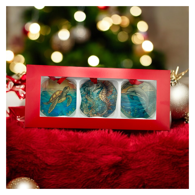 box with 3 ornaments with sea creatures