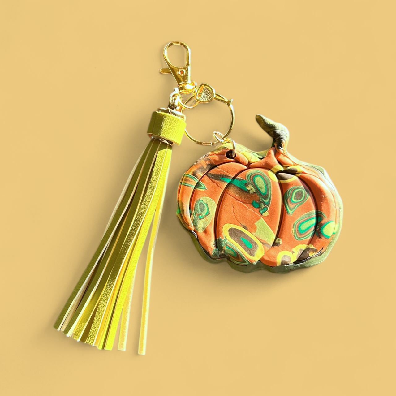 Handcrafted Pumpkin Bag Charm with Leather Tassel – Mokume Gane Polymer Clay Art