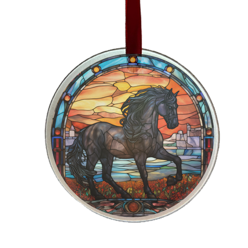 A round glass ornament with a stained glass window design featuring a black horse against a sunset background, finished with a red ribbon at the top.