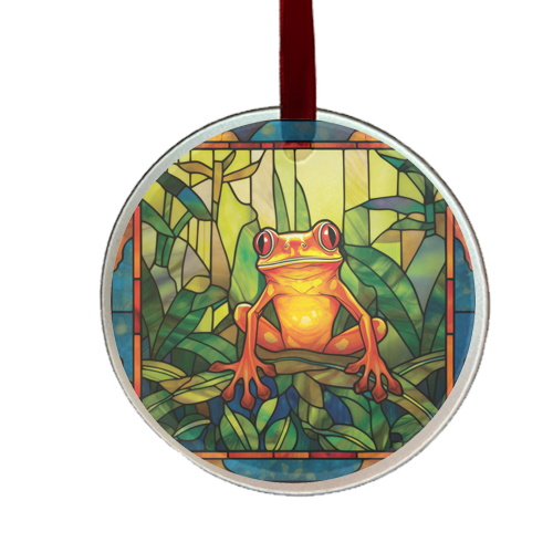 a round stain-glass looking ornament featuring a tree frog