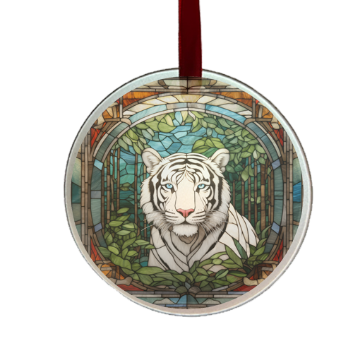 A round glass ornament featuring a stylized white tiger in a forest-like setting with green and red tones, and a satin ribbon at the top.