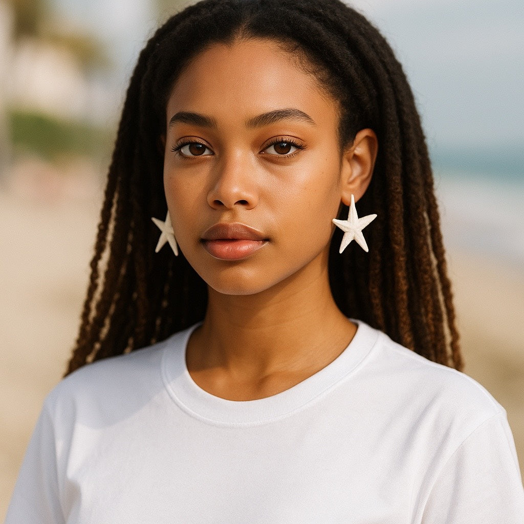 woman wearing handmade polymer clay starfish stud earrings