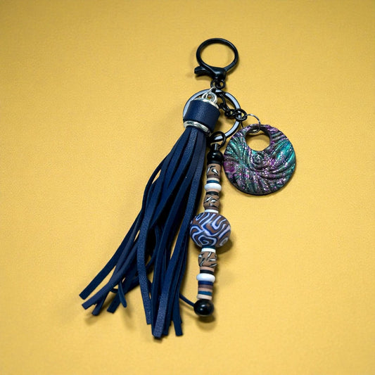 Midnight Swirl Bag Charm – Navy Tassel & Polymer Clay Ocean Pendant